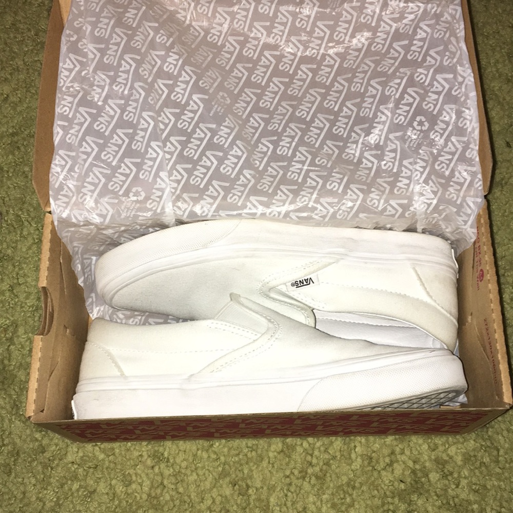 All white classic slip-on vans